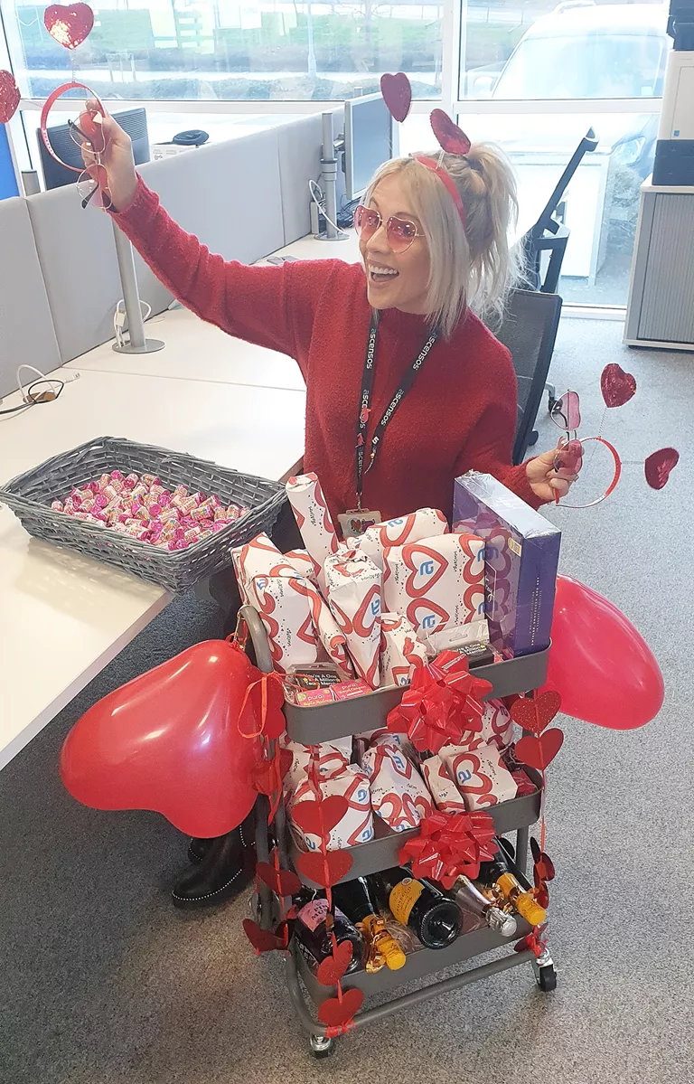 Lady opening valentine present